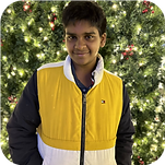 Portrait of a young man wearing a yellow vest outdoors