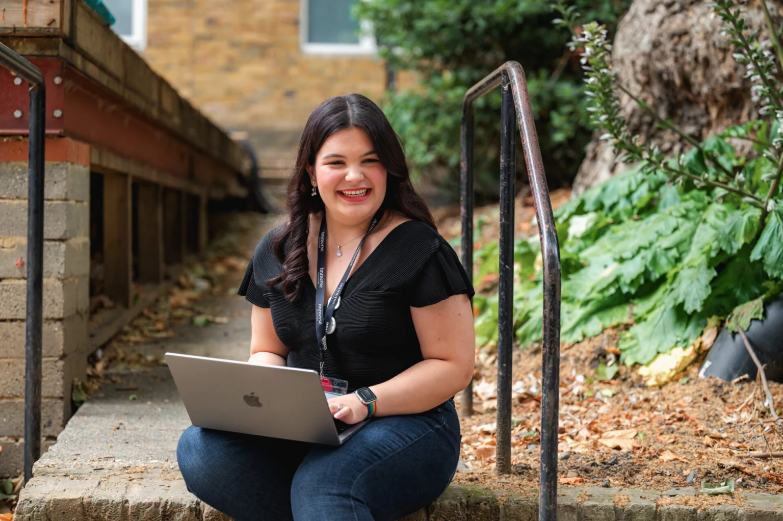 Student using a laptop outdoors